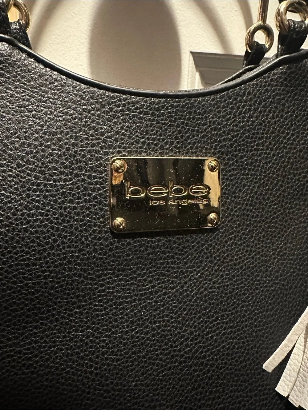 bebe Black Handbag with White & Black Tassels